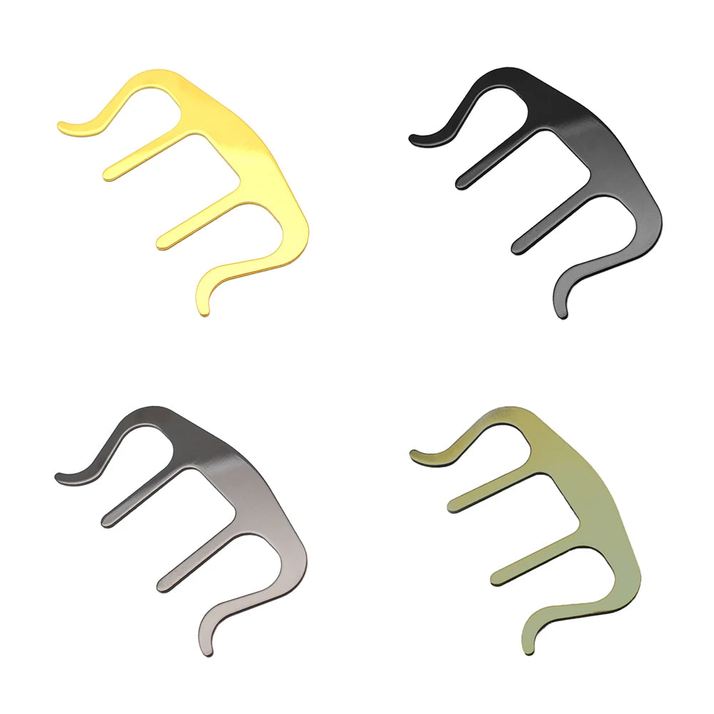 Four metal hair pick tools in different colors on a white background