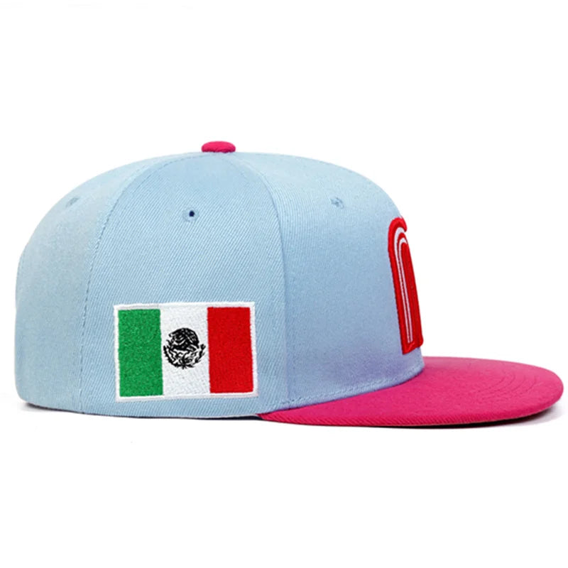 Mexico baseball hat snapback cap with 'M' logo and Mexican flag in sky glue with flat pink brim - side view.