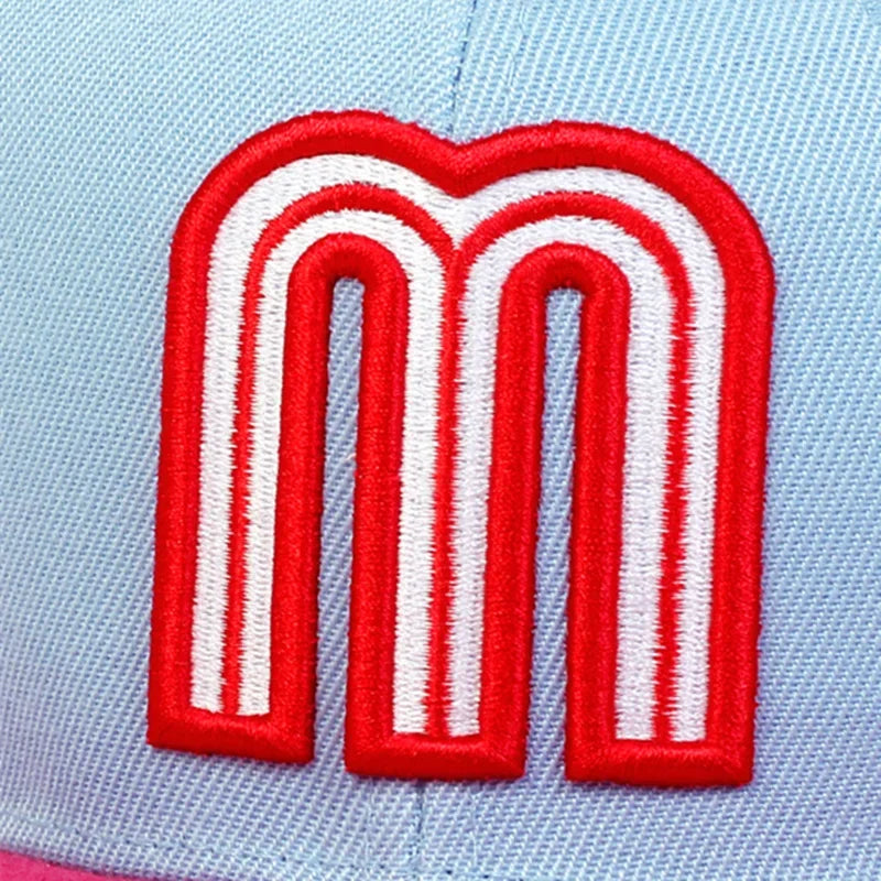 Mexico baseball hat snapback cap with 'M' logo and Mexican flag in pink and sky blue.