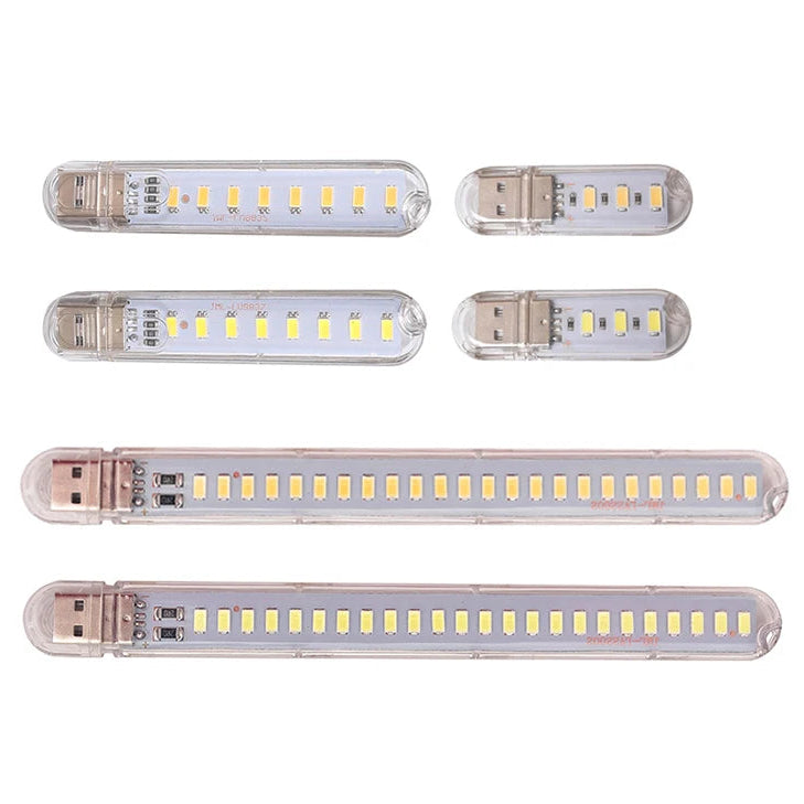 Set of five USB LED light sticks on a white background