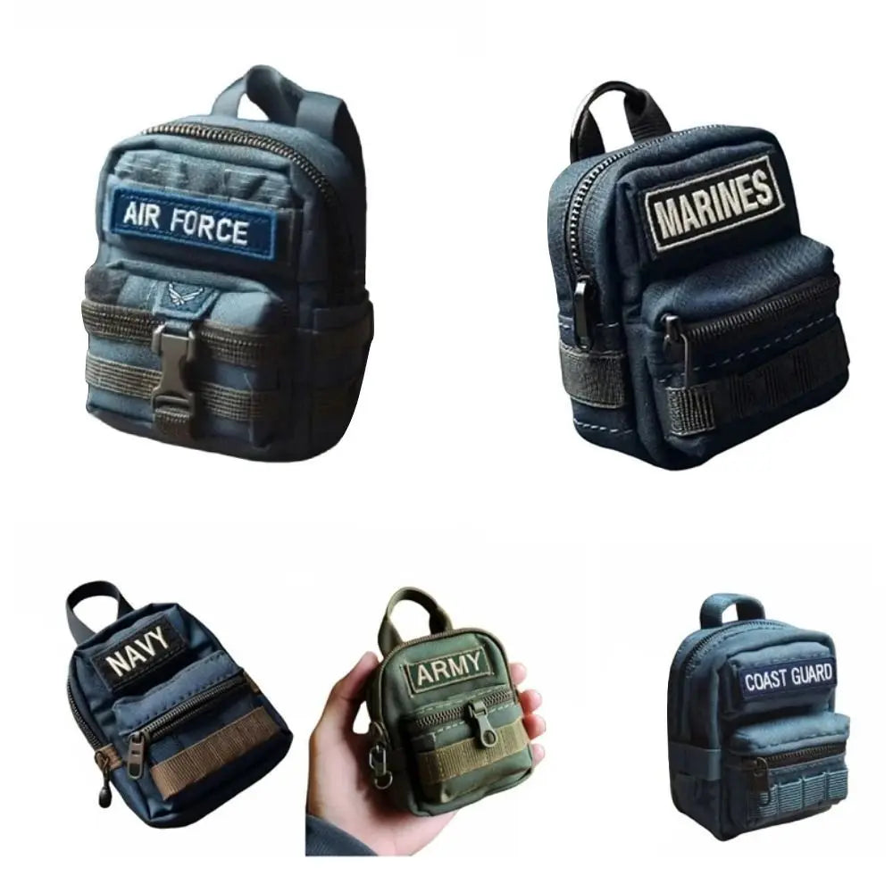 Set of miniature backpacks with Air Force, Marines, Navy, Army, and Coast Guard labels on a white background.