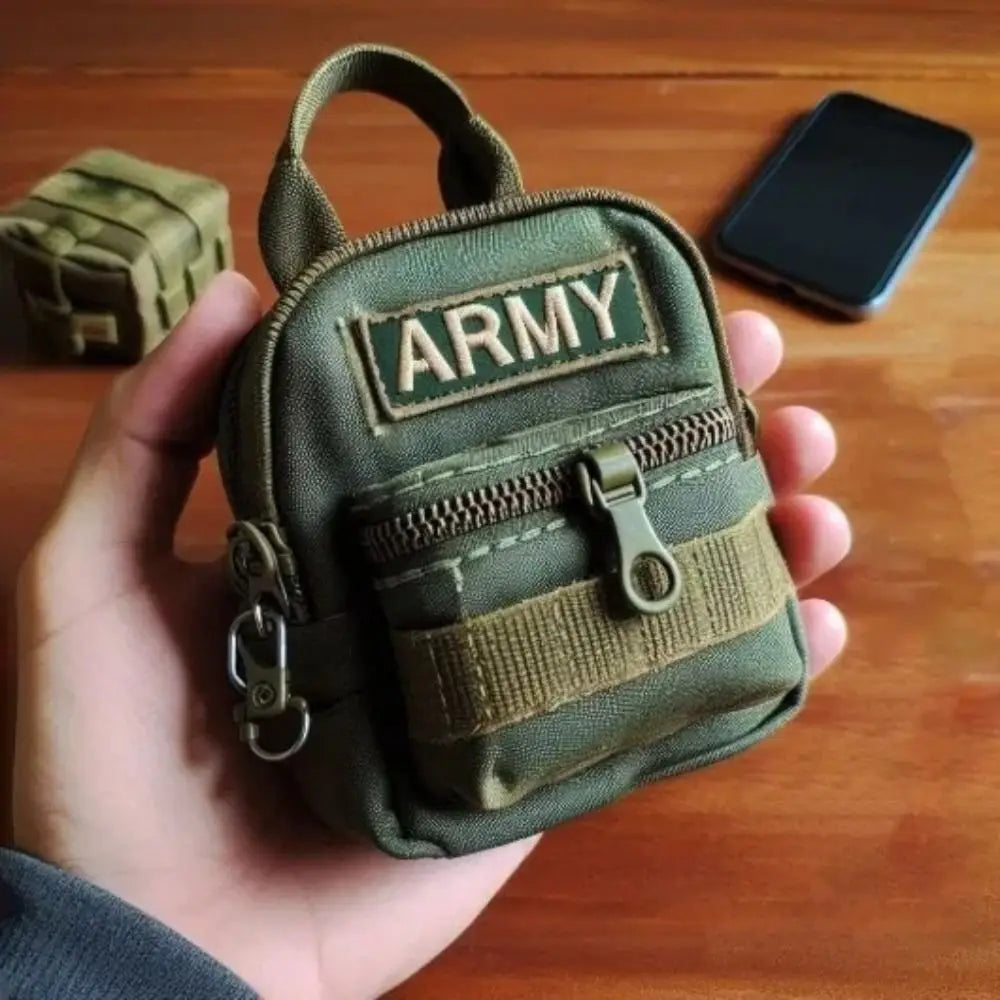 Green army-themed pouch held in a hand on a wooden surface