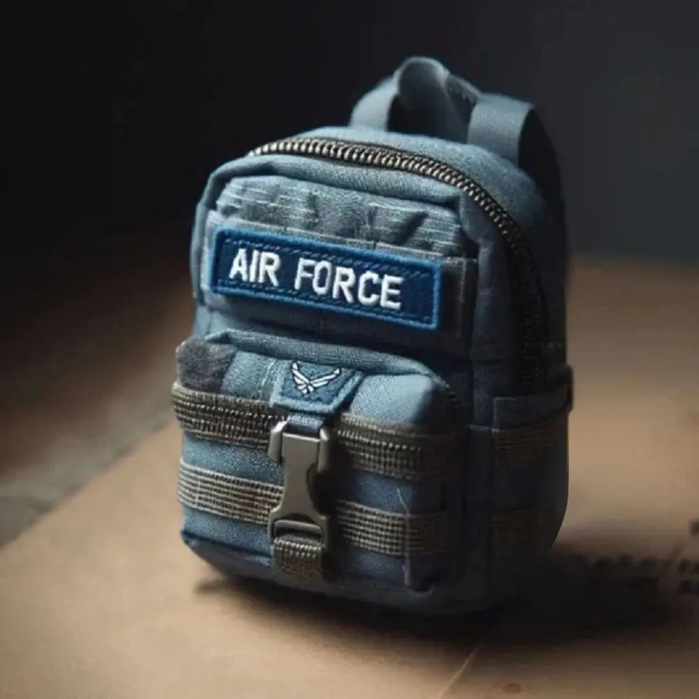 Small blue tactical pouch with 'Air Force' patch on a wooden surface