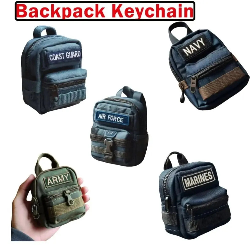 Set of miniature backpack keychains with labels for Coast Guard, Navy, Air Force, and Marines on a white background.