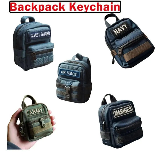 Set of miniature backpack keychains with labels for Coast Guard, Navy, Air Force, and Marines on a white background.