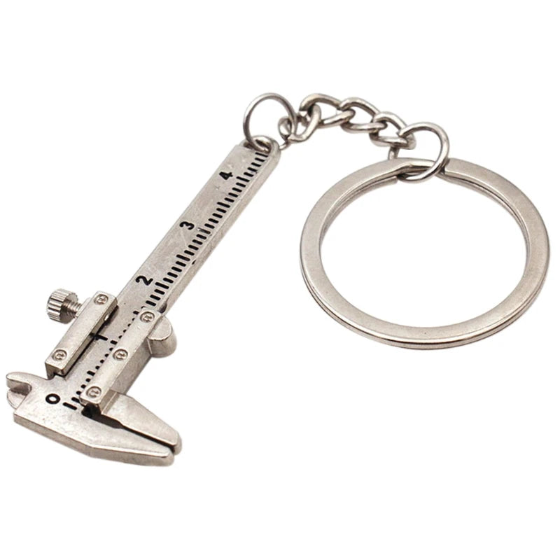 Metal caliper keychain on a white background