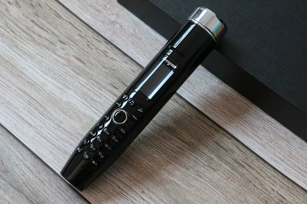 Multifunction novelty phone with built-in lighter, Bluetooth, flashlight, MP3/MP4 player, and voice changer.