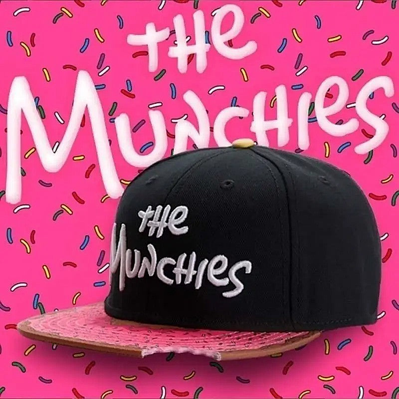 Black cap with 'the Munchies' text on a pink background with colorful sprinkles