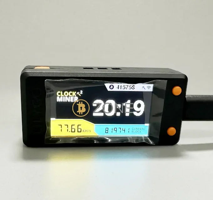 Close up of NerdMiner screen showing mining stats and network connection status.