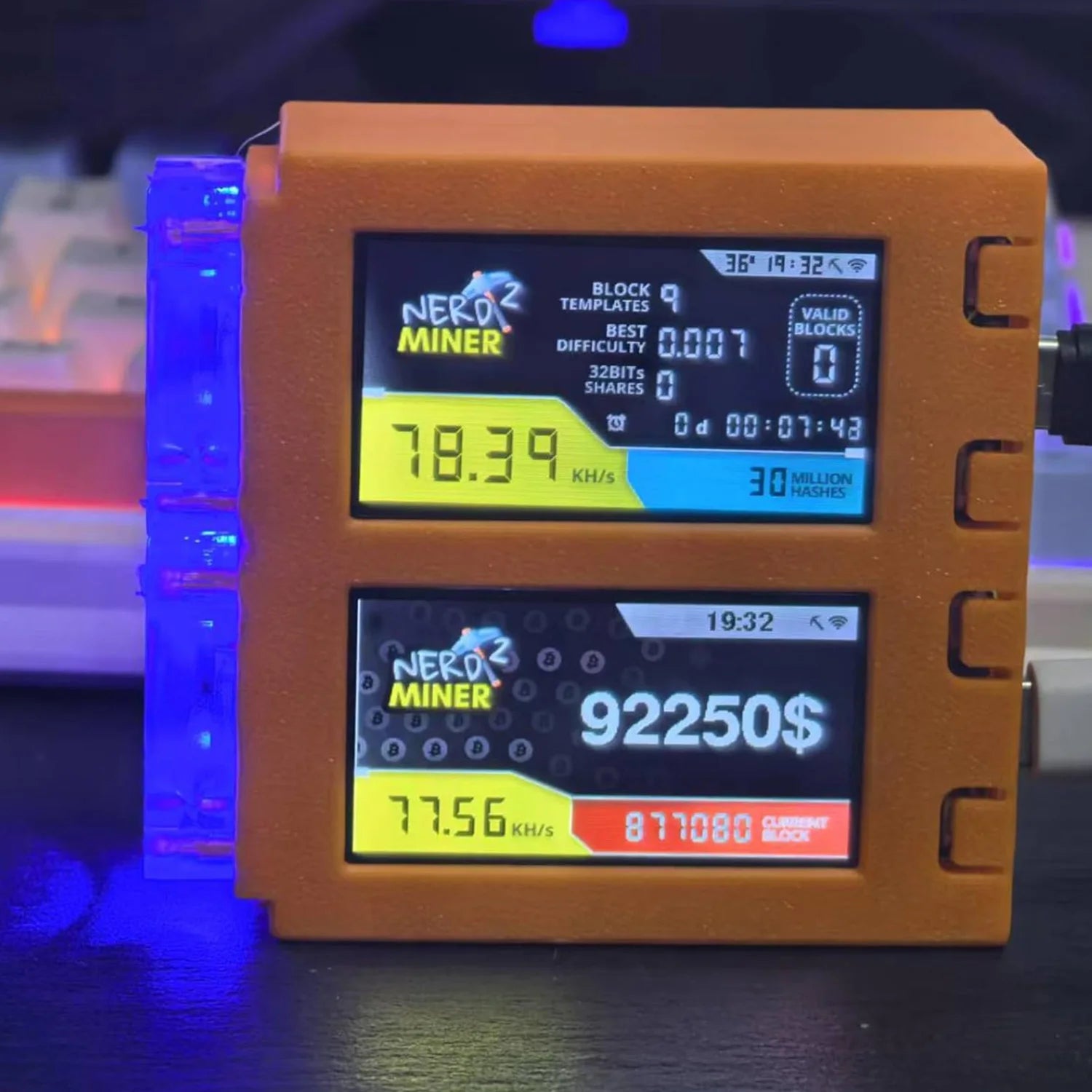 Digital device displaying mining statistics with a colorful background