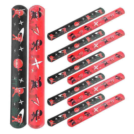 Set of red and black slaps band slap bracelets with ninja design on a white background