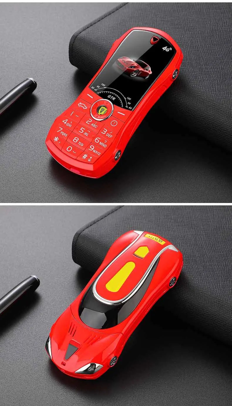 Red car-shaped wireless mobile phone on a dark surface
