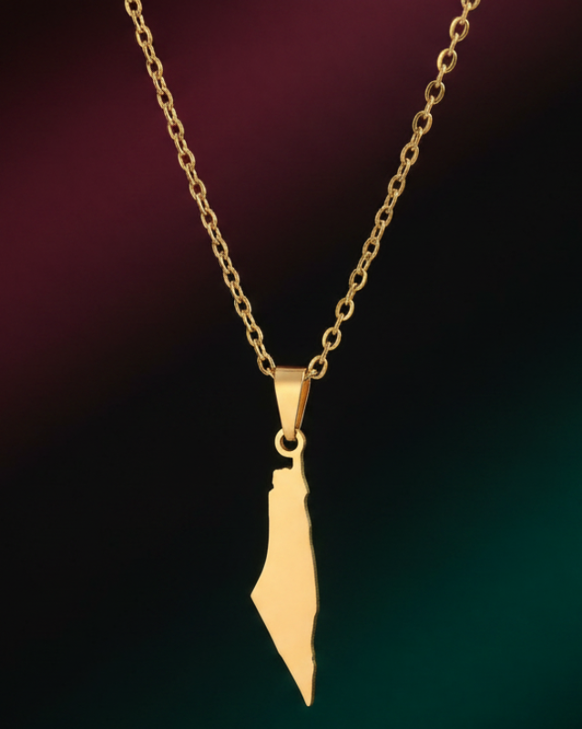 Gold necklace with a unique Palestinian pendant on a gradient background