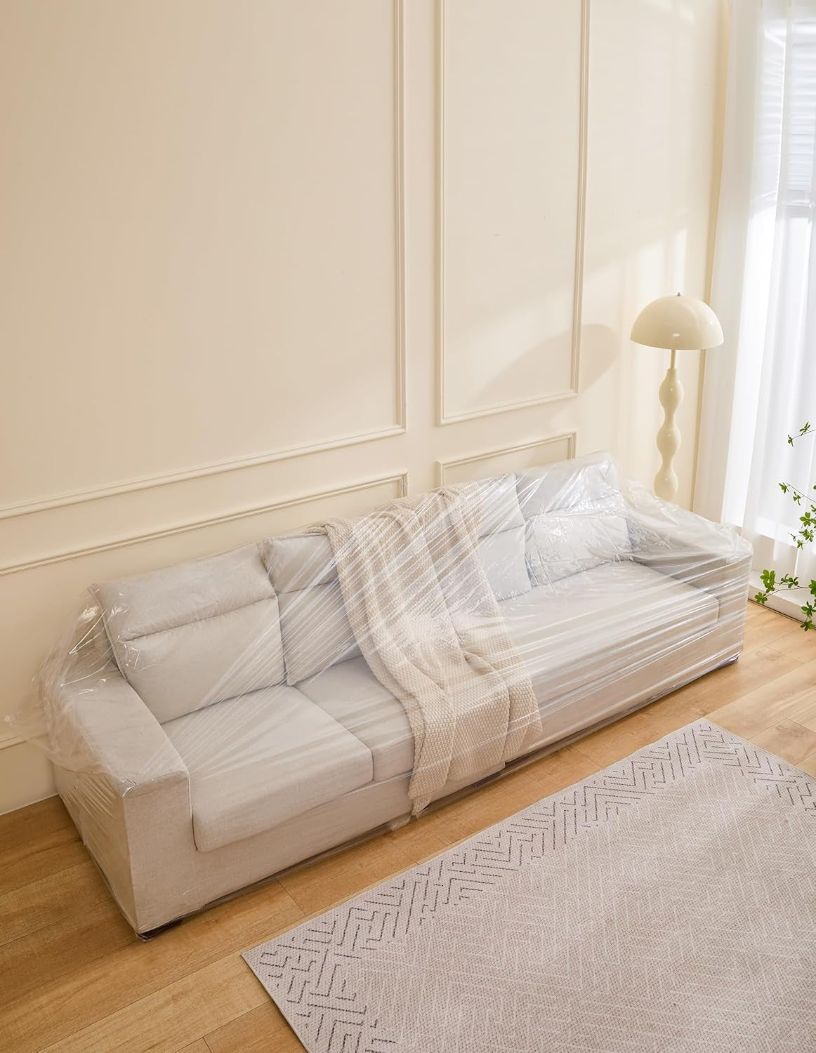 Perfect Pad Plastic Fresh Furniture Cover Liner: Safeguard Your Spot displayed in home seating area living room maintaining a clean and pristine environment.