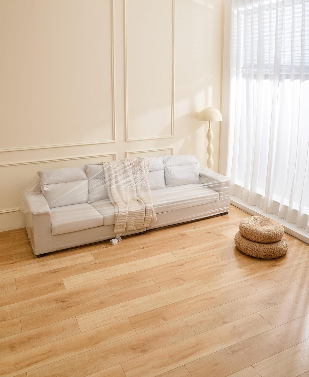 Perfect Pad Plastic Fresh Furniture Cover Liner displayed in living room area and tidy environment with clean wooden floors.