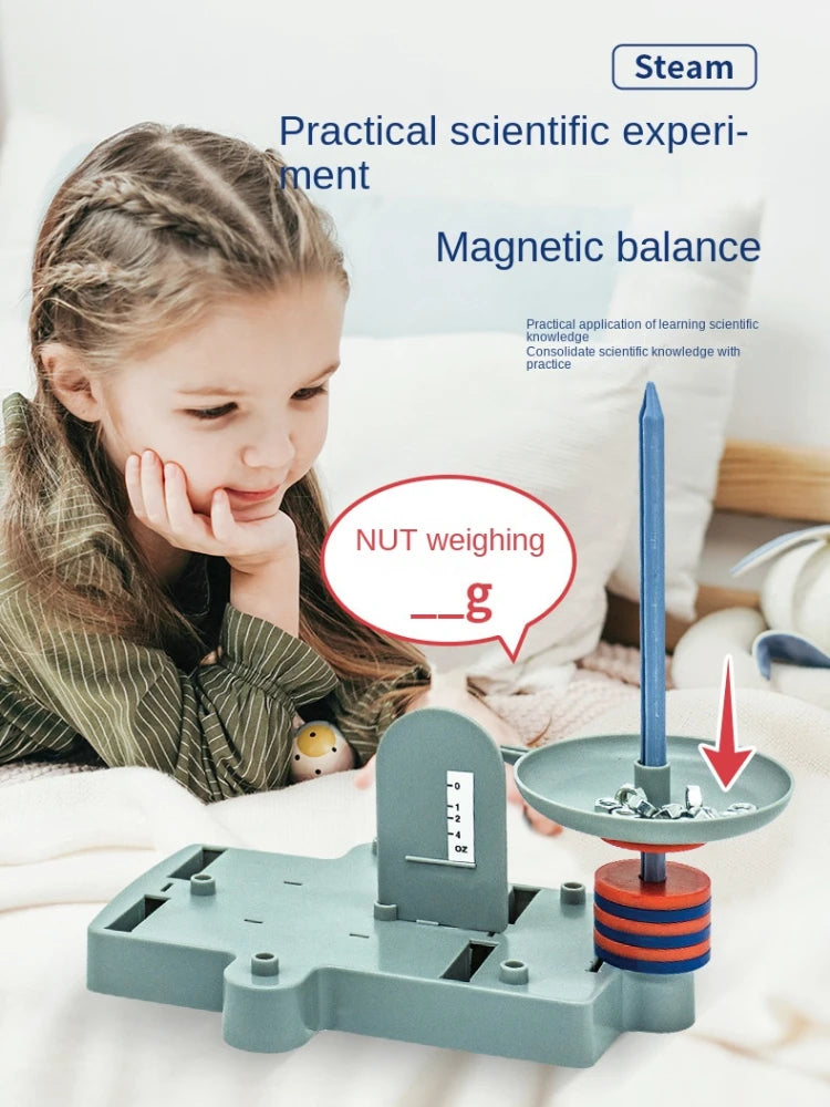 Child playing with a magnetic balance toy, focusing on scientific learning.