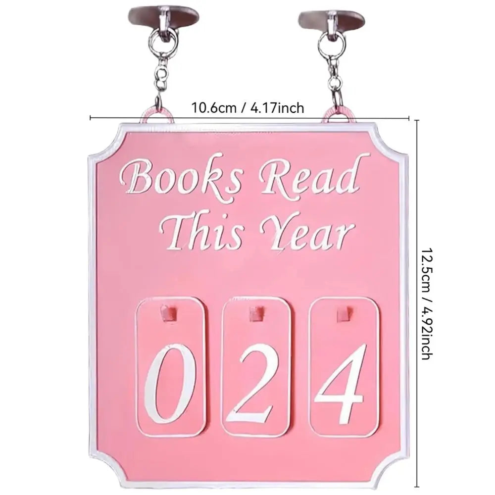 Pink plaque with 'Books Read This Year' and numbers, with dimensions indicated.