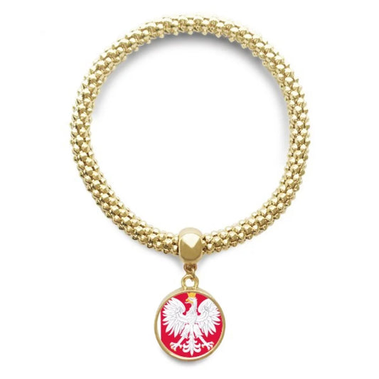 A gold-colored bracelet featuring a circular pendant with the Polish flag colors and the Polish eagle emblem.