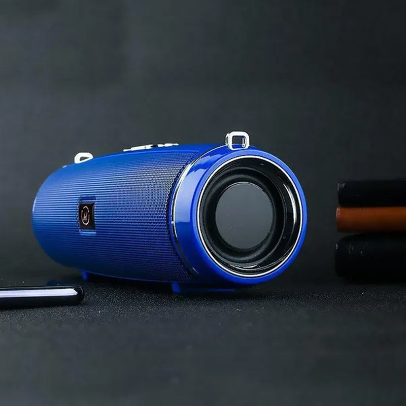 A blue waterproof portable speaker advertised with various features such as Bluetooth 5.1 connectivity, 360-degree surround sound, and a double horn for enhanced bass.
