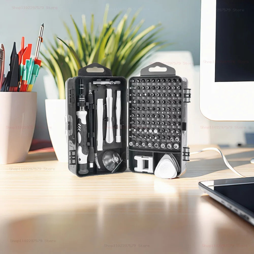 Close-up of the organized bit tray and ergonomic handle of the 115-in-1 precision toolkit.