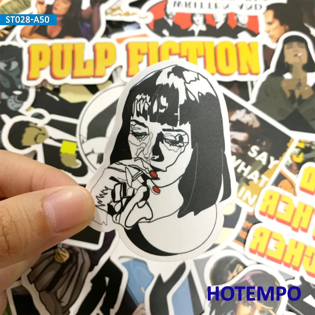 Sticker of a woman with black hair held over a collage of 'Pulp Fiction' movie stickers.