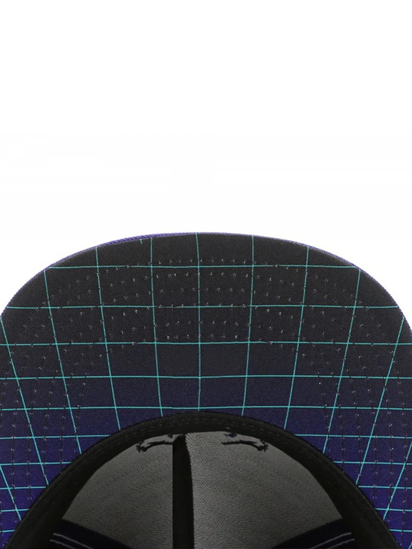 Close-up of a black cap with a blue grid pattern on a white background