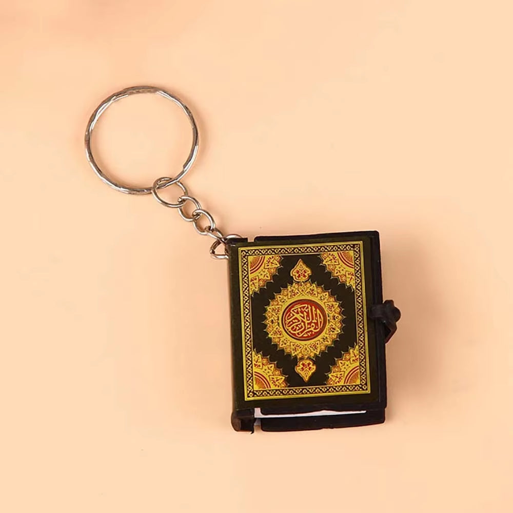 Keychain Qur’an laid flat on table