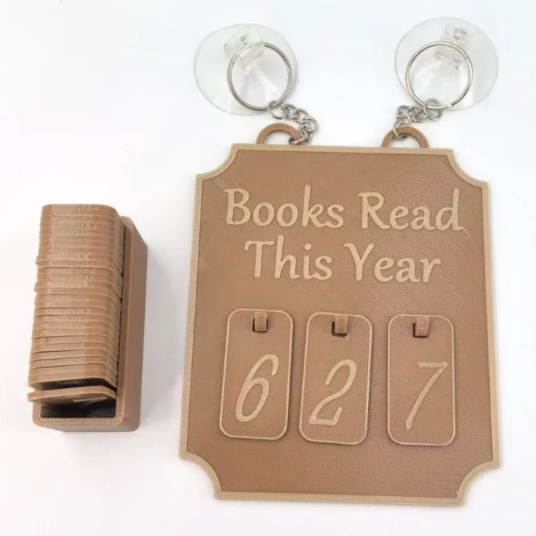 Light brown book tracker with 'Books Read This Year' text and number holder on a white background