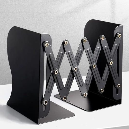 Black adjustable bookend on a white surface with a gray background