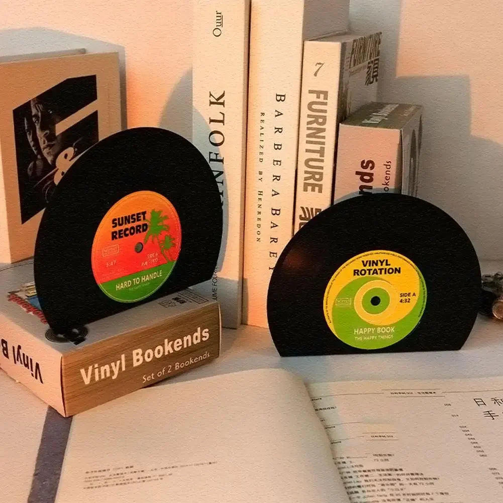 Retro vinyl record bookends facing out and angled from book collection displaying unique labels.