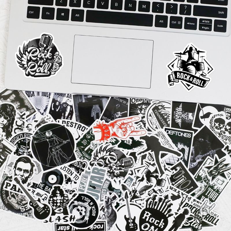 Collection of rock-themed stickers on a laptop