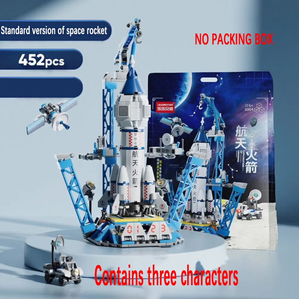 Space rocket model building kit with packaging on a light blue background