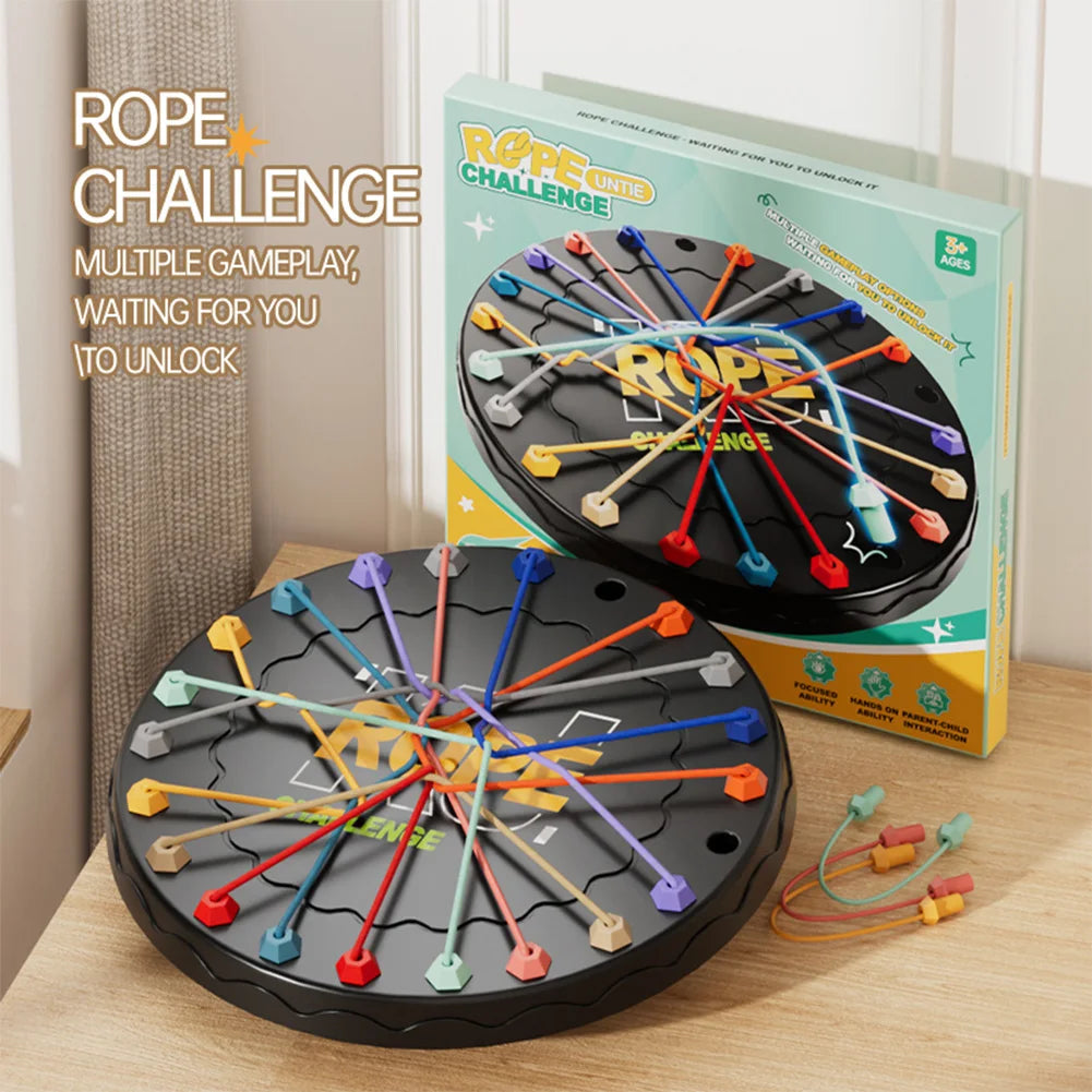 Rope Challenge game with colorful ropes on a wooden surface, featuring the game's packaging.