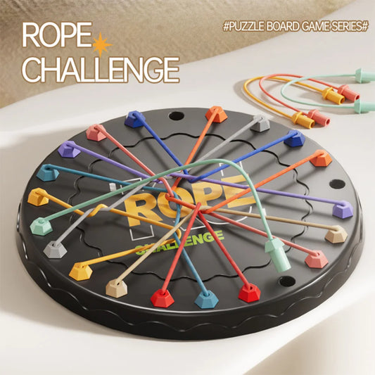 Rope Challenge puzzle board game with colorful ropes on a white surface