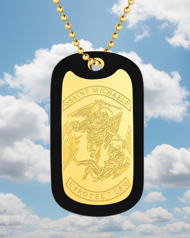 Gold dog tag with 'Saint Michael Protect Us' engraving against a cloudy sky background