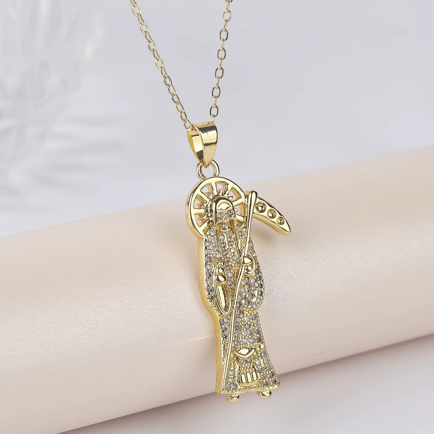Image of Santa Muerte Bust-Down Piece & Chain Necklace by Protect Ya Neck Designer Jewelry Pieces design option over a white background.