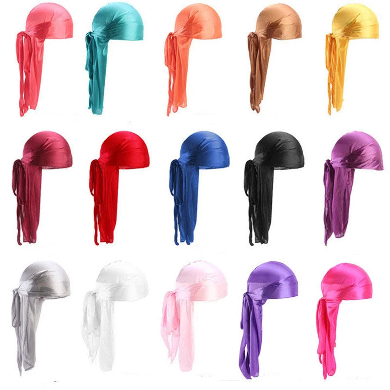 Collection of colorful satin silk durags in various colors on a white background.