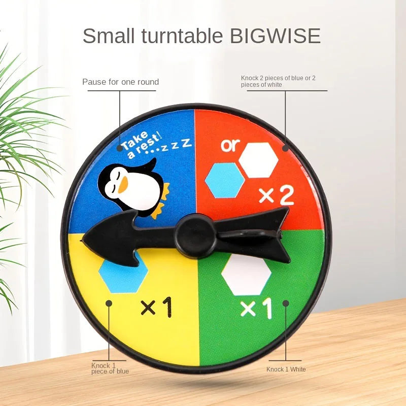 Colorful turntable with game instructions on a wooden surface
