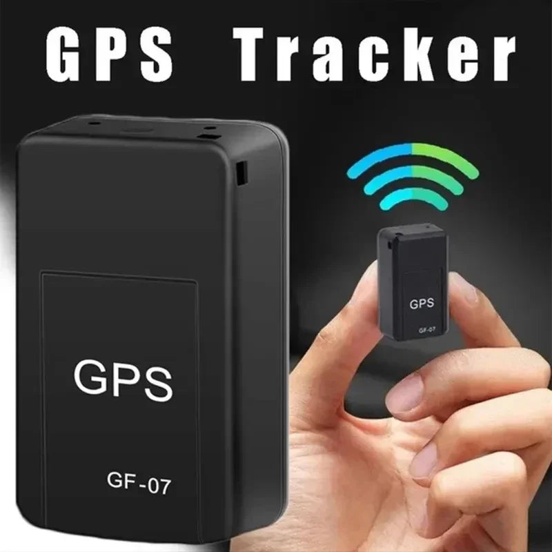 GPS tracker with a hand holding a smaller GPS device, set against a dark background.