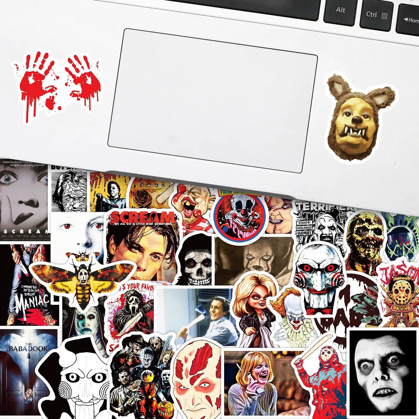 Collage of horror movie stickers with various characters and elements on a white background.
