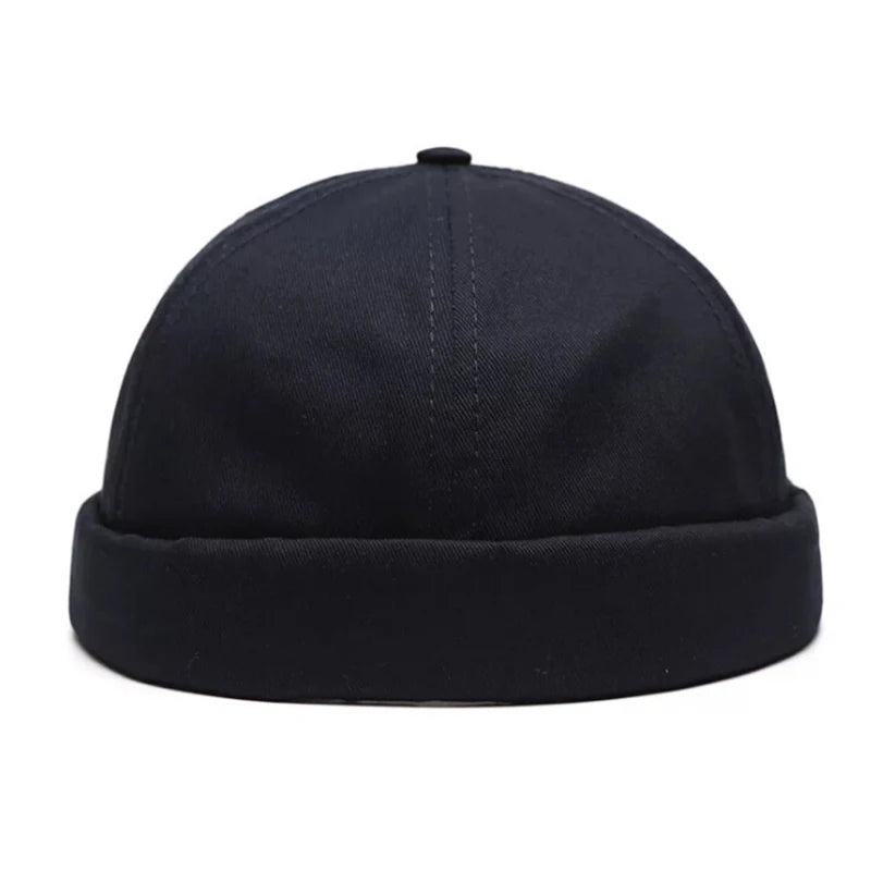 Black beanie hat on a white background