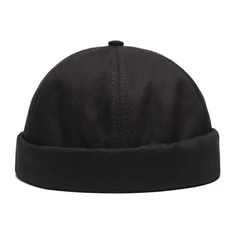 Black beanie hat on a white background