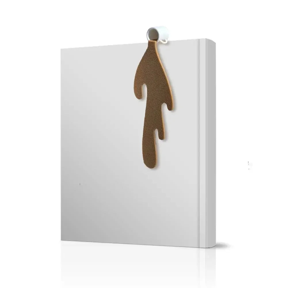 Spilled coffee bookmark on book over a white background