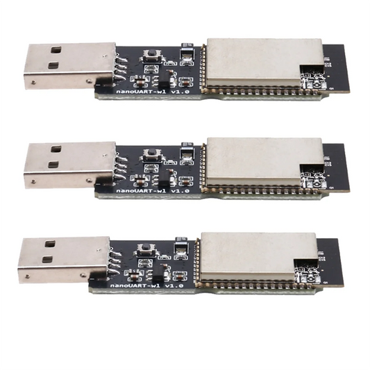 Three USB to UART adapter boards on a white background