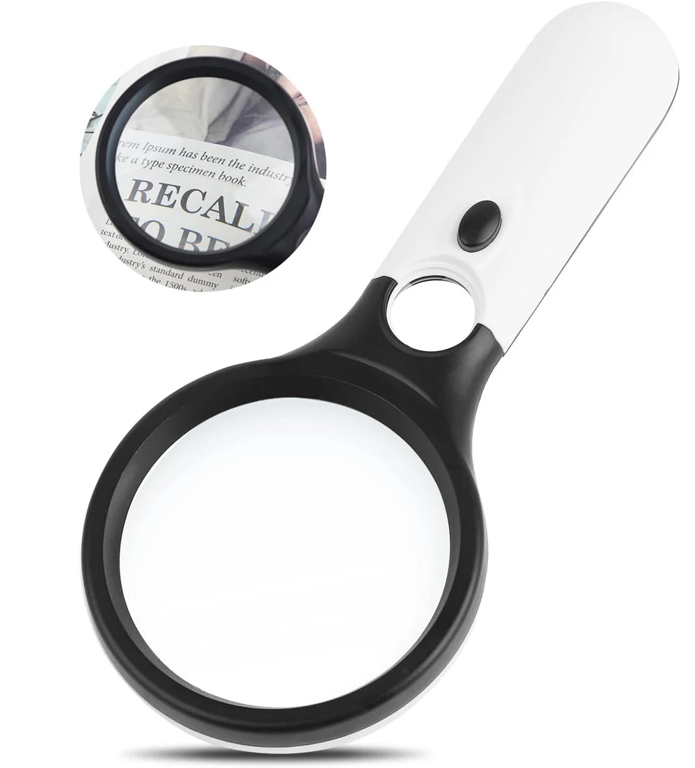 Magnifying glass with black frame and white handle held over a document with text.