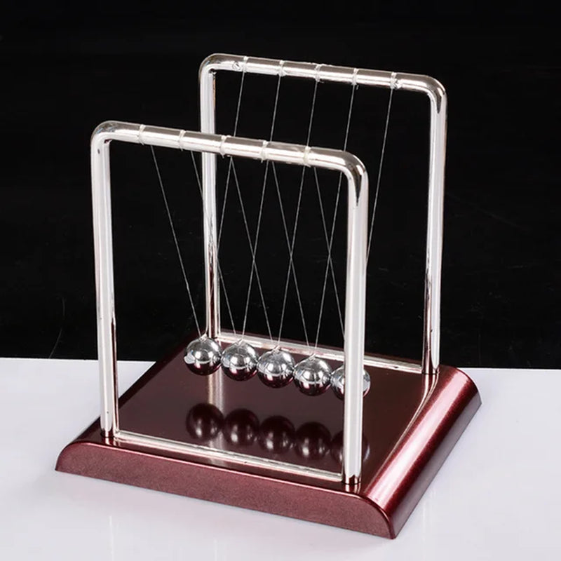 Goal Post style 'Table Newton Pendulum | Terrific Scientific Desk-Decoration' in motion.