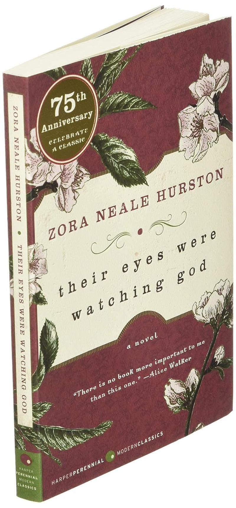 Angled view of book showing spine and front cover of "Their Eyes Were Watching God" by Zora Neale Hurston, with floral wrap pattern.