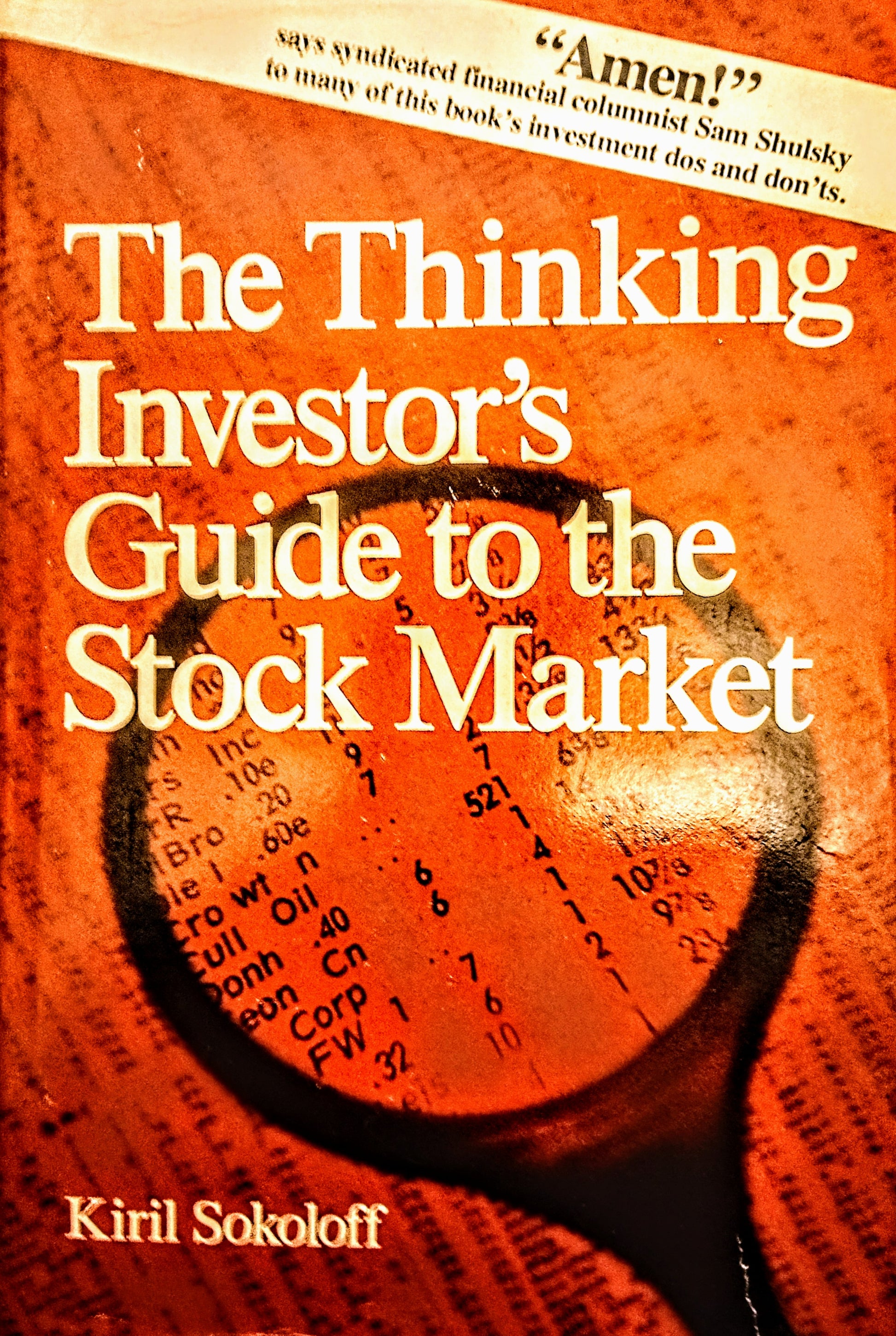 Book cover of 'The Thinking Investor's Guide to the Stock Market' with a magnifying glass over text.