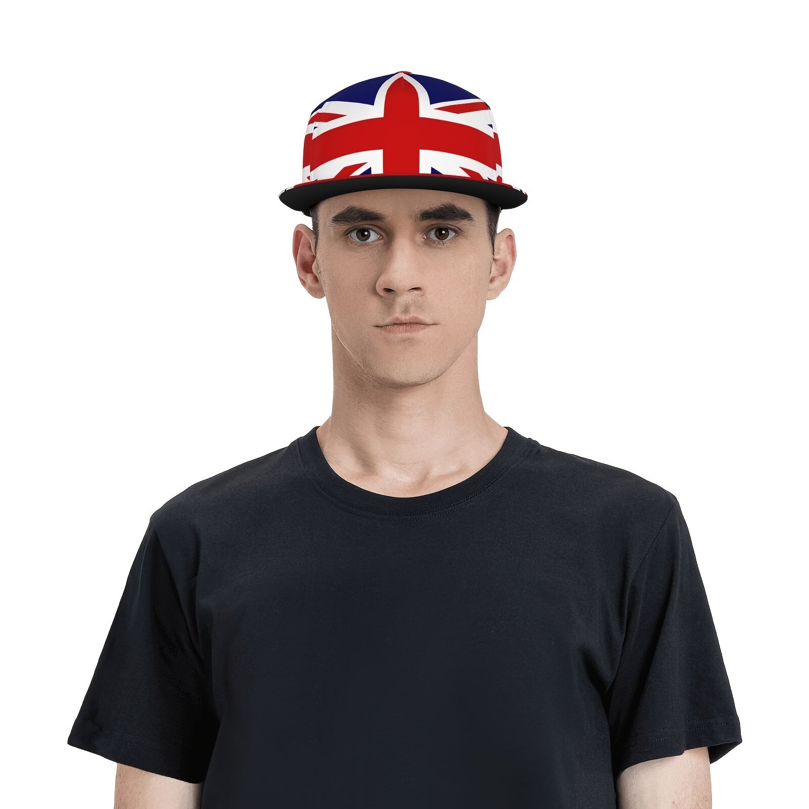 Man wearing a black t-shirt and a Union Jack snapback cap on a white background