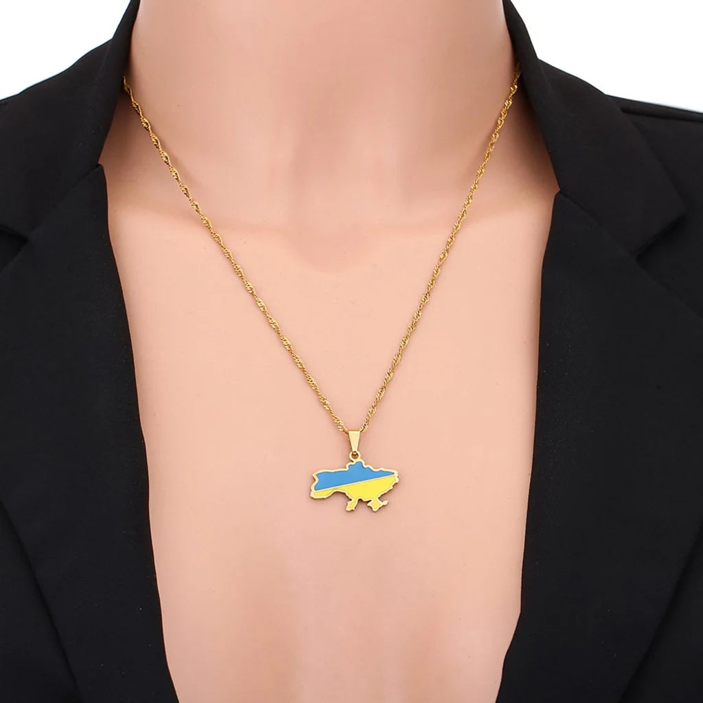 Ukrainian Map Necklace shown being worn over clavicle displaying appearance when wearing.